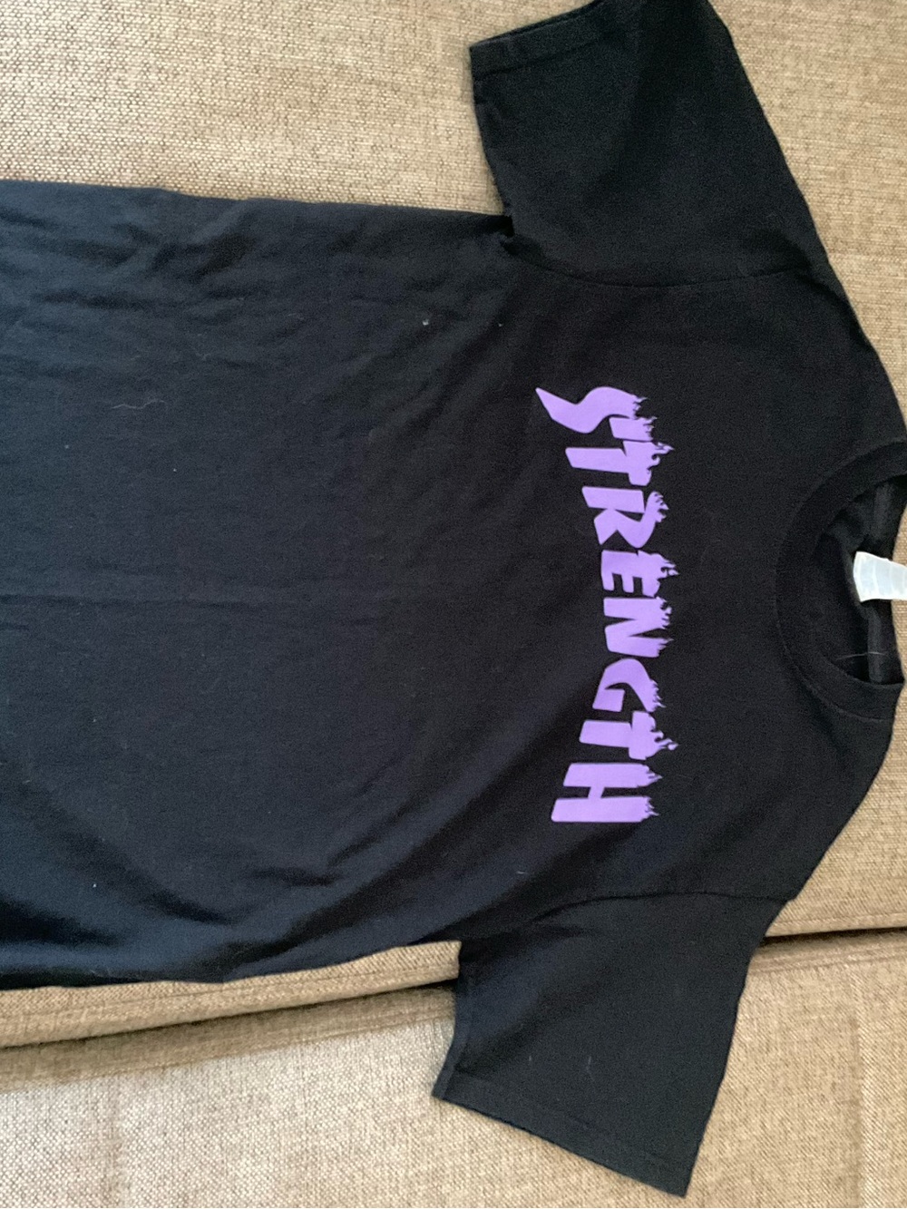 Black Short-Sleeve Tee with Purple "STRENGTH" Graphic